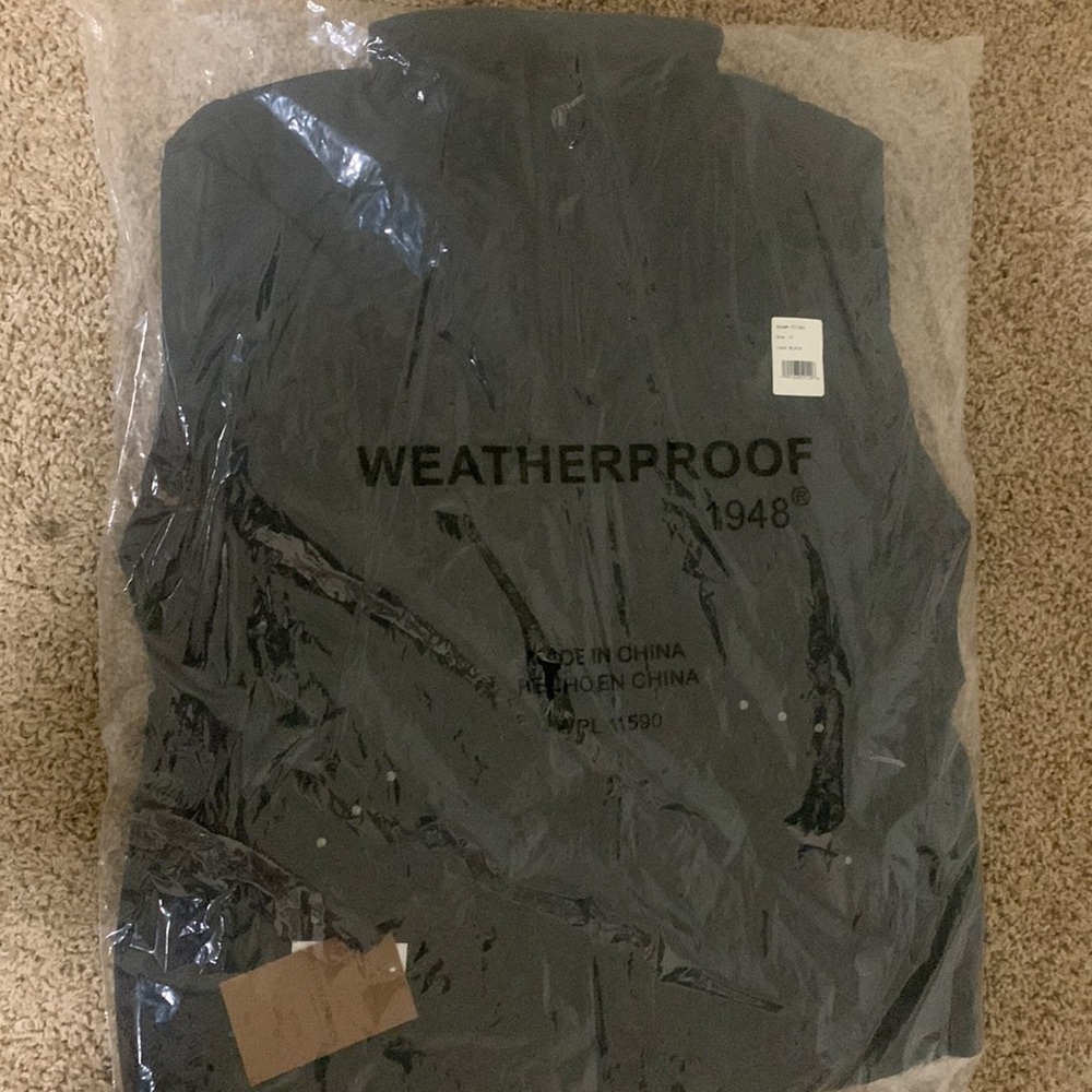 Black weatherproof vest